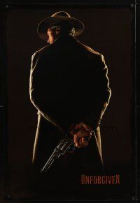 4b818 UNFORGIVEN undated teaser 1sh '92 classic image of gunslinger Clint Eastwood w/back turned!