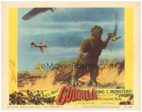 4f087 GODZILLA KING OF THE MONSTERS LC #3 '56 great image of Gojira crushing airplanes in the sky!