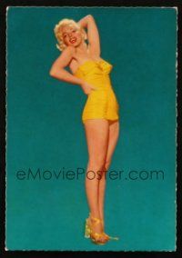 4p184 MARILYN MONROE German 4x6 postcard '60s in sexy skimpy yellow outfit over blue background!