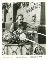 4t288 CHARLTON HESTON signed 8x10.25 still R69 classic image from famous chariot race in Ben-Hur!