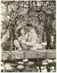 5g008 ANNA KARENINA deluxe 10.25x13.25 still '35 Greta Garbo held by Fredric March in garden!