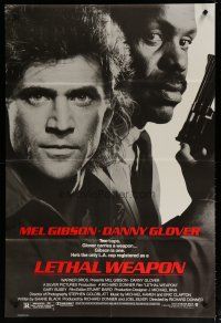 5h518 LETHAL WEAPON 1sh '87 great close image of cop partners Mel Gibson & Danny Glover!