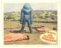 5j466 EARTH VS. THE FLYING SAUCERS LC '56 cool image of alien robot standing over dead men!