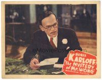 5j699 MYSTERY OF MR WONG LC '39 close up of Asian detective Boris Karloff examining letter!