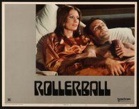 5j795 ROLLERBALL LC #5 '75 close up of James Caan & sexy Maud Adams in bed!