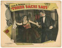 5j913 THREE FACES EAST LC '26 German spy Clive Brook grabs English spy Jetta Goudal!
