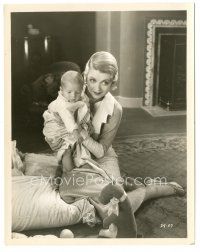 5k209 BORN TO LOVE 8x10.25 still '31 close up of pretty Constance Bennett holding cute baby!