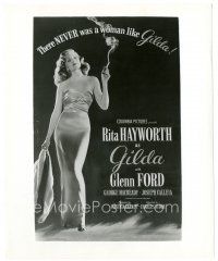 5k397 GILDA 8.25x10 still R59 classic image of sexy smoking Rita Hayworth in sheath dress