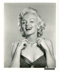 5k619 MARILYN MONROE 8.25x10 still '55 in low-cut dress holding her necklace from Seven Year Itch!