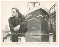 5k693 ON THE WATERFRONT 8x10.25 still '54 c/u of Marlon Brando sitting on cable by cargo ship!
