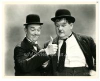 5k831 STAN LAUREL/OLIVER HARDY 8x10 still '30s Ollie is shocked at Stan's burning thumb!
