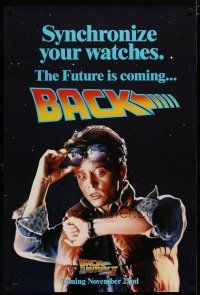 5p069 BACK TO THE FUTURE II teaser DS 1sh '89 Michael J. Fox as Marty, synchronize your watch!