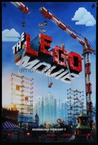 5p459 LEGO MOVIE teaser DS 1sh '14 cool image of title assembled w/cranes & plastic blocks!