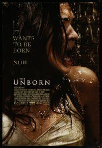 5p795 UNBORN advance DS 1sh '09 close up of Odette Yustman, it wants to be born!
