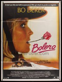 5s783 BOLERO French 1p '84 c/u of sexy Bo Derek with rose in mouth, different art by Landi!