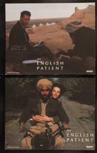 6b143 ENGLISH PATIENT 8 LCs '96 Anthony Minghella, Ralph Fiennes writing in his notebook in desert!