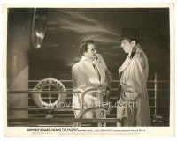 6c068 ACROSS THE PACIFIC 8x10.25 still '42 c/u of Humphrey Bogart & Mary Astor on ship's deck!
