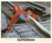 6c035 SUPERMAN 8x10 mini LC '78 special effects c/u of Christopher Reeve fixing train tracks!