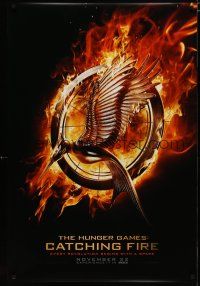 6e421 HUNGER GAMES: CATCHING FIRE teaser DS 1sh '13 every revolution begins with a spark!