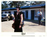 6h811 SOMETHING WILD LC #1 '86 Jeff Daniels looks at Melanie Griffith across motel parking lot!