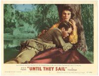 6h936 UNTIL THEY SAIL LC #5 '57 close up of lovers Paul Newman & sexy Jean Simmons under tree!