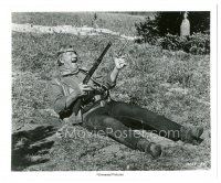 6t865 ROOSTER COGBURN 8.25x9.75 still '75 John Wayne laying on ground shooting pistol & rifle!