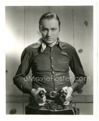6t901 SONG OF THE BUCKAROO 8.25x10 still '39 best portrait of intense Tex Ritter pointing 2 guns!