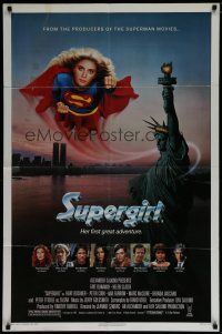 6w793 SUPERGIRL 1sh '84 super Helen Slater in costume flying over Statue of Liberty!