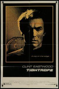 6w861 TIGHTROPE 1sh '84 Clint Eastwood is a cop on the edge, cool handcuff image!