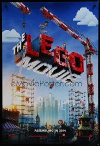 6x484 LEGO MOVIE int'l teaser DS 1sh '14 cool image of title assembled w/cranes & plastic blocks!