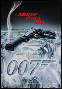 7d416 DIE ANOTHER DAY teaser Spanish '02 Brosnan as James Bond, image of smoking gun melting ice!