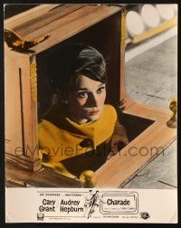 7e096 CHARADE French LC '63 close up of Audrey Hepburn watching stage from inside box!