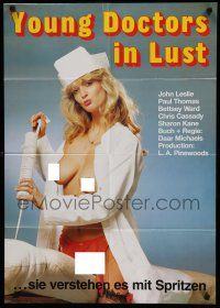 7e714 YOUNG DOCTORS IN LUST German '83 Sharon Kane, image of super-sexy topless nurse!