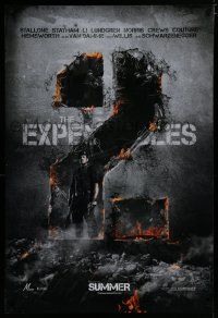 7f236 EXPENDABLES 2 teaser DS 1sh '12 image of tough-guy Sylvester Stallone in blown-up building!