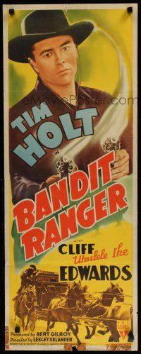 7j035 BANDIT RANGER insert '42 wonderful artwork of Tim Holt with two smoking guns!