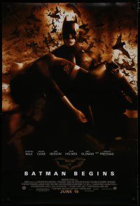 7k083 BATMAN BEGINS June 15 advance DS 1sh '05 Bale as the Caped Crusader carrying Katie Holmes!