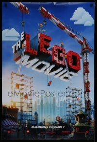 7k457 LEGO MOVIE teaser DS 1sh '14 cool image of title assembled w/cranes & plastic blocks!