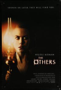 7k581 OTHERS DS 1sh '01 creepy close up image of Nicole Kidman with lantern, horror!