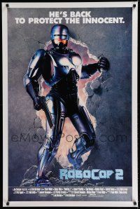 7k666 ROBOCOP 2 int'l 1sh '90 cyborg policeman Peter Weller busts through wall, scii-fi sequel!