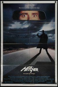 7p382 HITCHER 1sh '86 Rutger Hauer, C. Thomas Howell, terror starts the moment he stops!