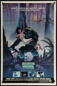7p834 SWAMP THING 1sh '82 Wes Craven, Richard Hescox art of him holding sexy Adrienne Barbeau!