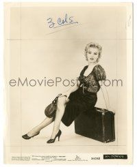 7s119 BUS STOP 8x10.25 still '56 full-length portrait of sexy Marilyn Monroe sitting on suitcase!