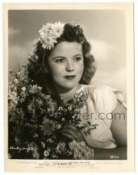 7s397 I'LL BE SEEING YOU 8x10.25 still '45 portrait of pretty grown-up Shrley Temple with flowers!
