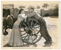 7s956 WEST OF THE PECOS 8.25x10 still '45 Robert Mitchum & Barbara Hale by wagon wheel, Zane Grey!