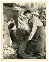 7s960 WHILE PARIS SLEEPS 8x10.25 still '32 large man yells at Victor McLaglen in marketplace!