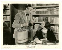 7s034 ACCENT ON YOUTH 8x10.25 still '35 Herbert Marshall offers pill to Sylvia Sidney in her study