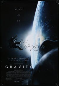 7w242 GRAVITY October advance DS 1sh '13 Sandra Bullock, George Clooney, adrift in space!