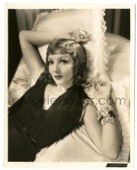 8h210 CLAUDETTE COLBERT 8x10.25 still '33 on pillows in silk dress & bracelets from Tonight Is Ours!