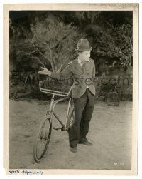 8h587 LONG PANTS 8x10.25 still '27 great close up of Harry Langdon standing by cool bicycle!
