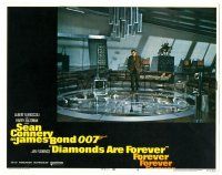 8p446 DIAMONDS ARE FOREVER LC #8 '71 Sean Connery as James Bond walking over huge scale model!